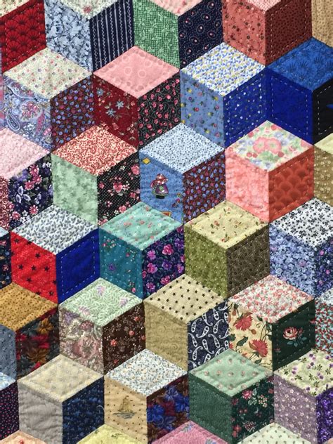 Designed by Barbara Clayton. . Tumbling blocks quilt pattern instructions